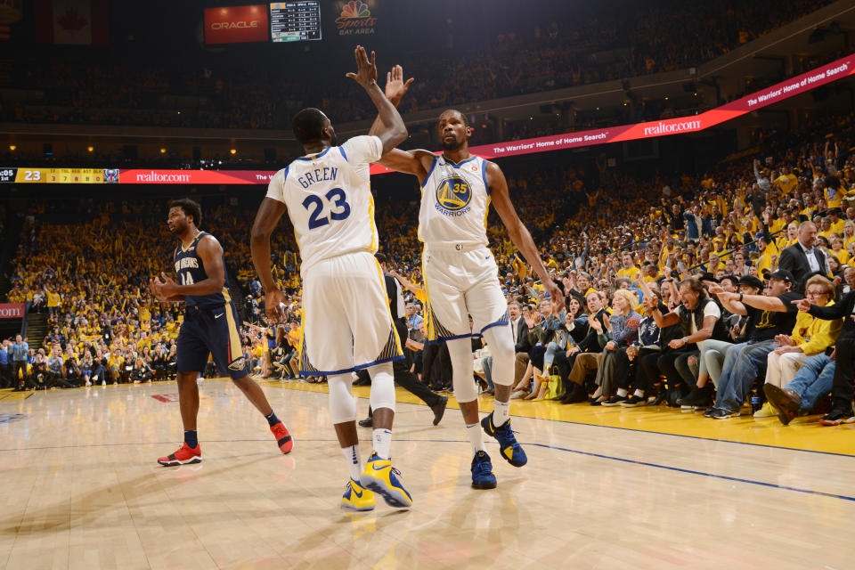 Kevin Durant and Draymond Green led a storm of offense for the Warriors in Game 1. (Getty Images)