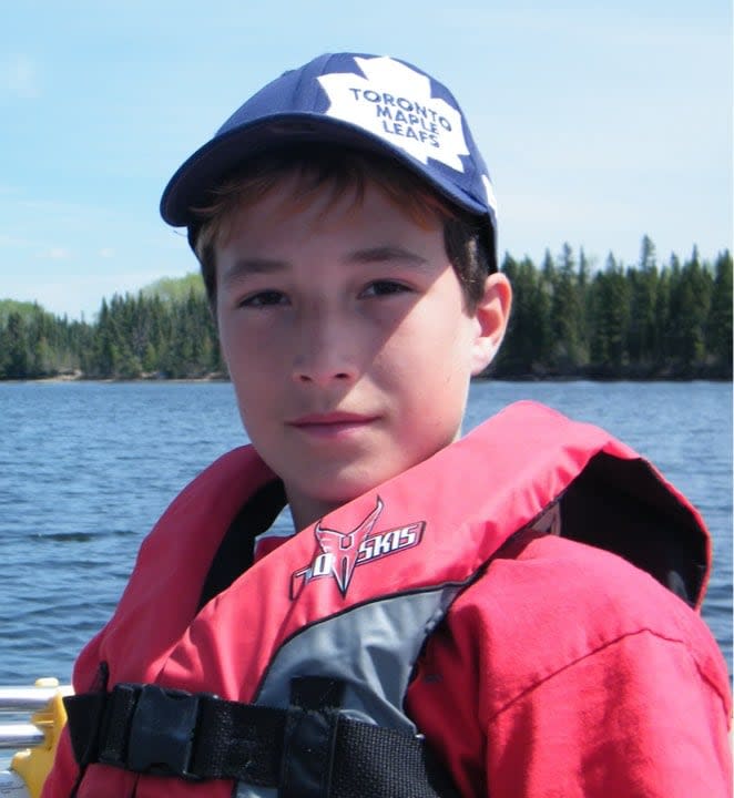 A young Austin (Auzi) Walker during a lake trip. Walker died in what Saskatoon police say was a hit and run on June 22, 2024.