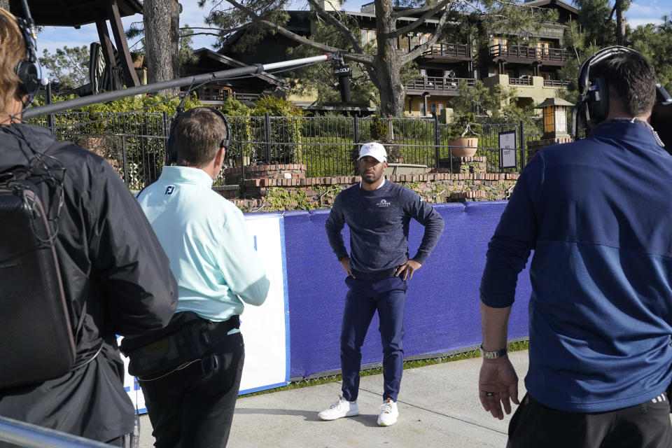 Willie Mack gives an interview after finishing the first round of the Farmers Insurance Open golf tournament at Torrey Pines on Thursday, Jan. 28, 2021, in San Diego. (AP Photo/Gregory Bull)