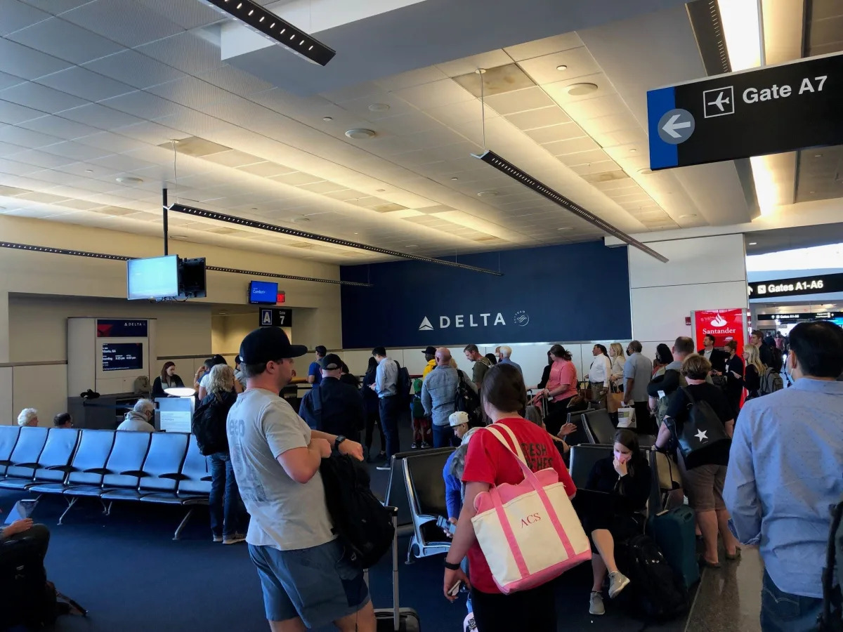 Dozens of Delta passengers have been stranded at the Atlanta airport for more th..