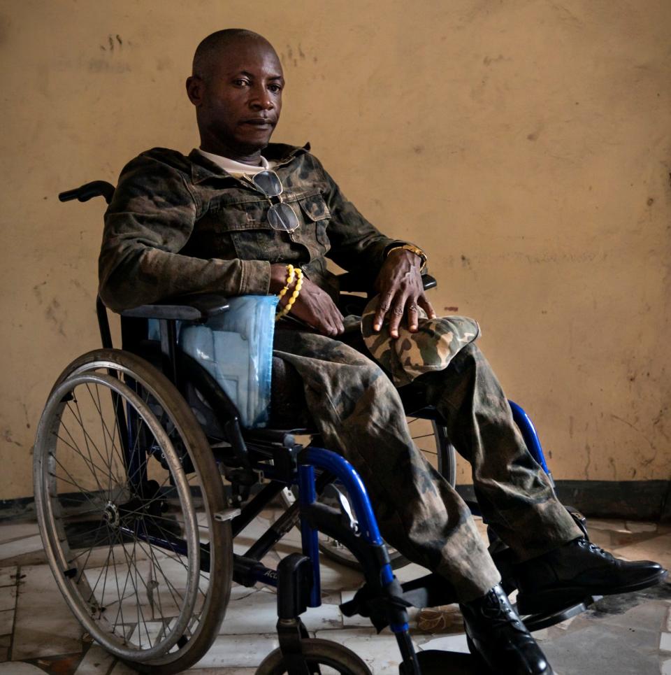 Olivier Bakweto, a polio survivor, waits in the office of the Congolese Association for the Liberation and the Development of Handicaped Women - Diana Zeyneb Alhindawi/United Nations Foundation