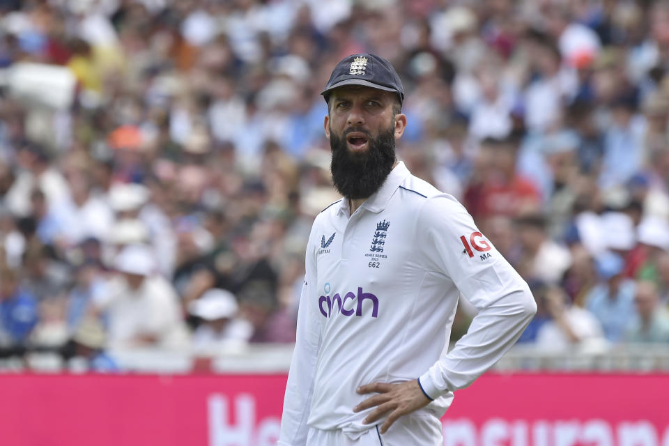 England's Moeen Alilooks round from this fielding position on the boundary during day three of the first Ashes Test cricket match between England and Australia at Edgbaston, Birmingham, England, Sunday, June 18, 2023. (AP Photo/Rui Vieira)