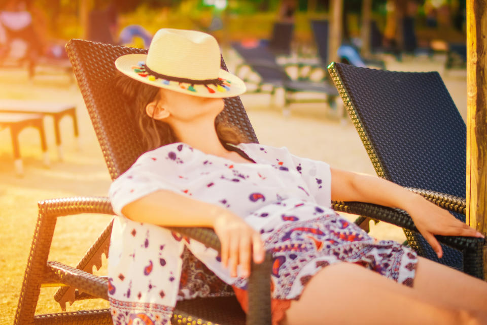 A bad night's sleep often means we end up snoozing on the sunlounger. (Getty Images)