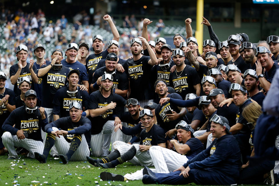 MILWAUKEE, WISCONSIN - SEPTEMBER 26: Milwaukee Brewers celebrates winning the Central Division title after the game against the New York Mets at American Family Field on September 26, 2021 in Milwaukee, Wisconsin. Brewers defeated the Mets 8-4. (Photo by John Fisher/Getty Images)