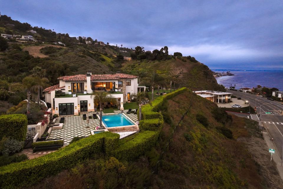 malibu home perched on a hill overlooking the ocean