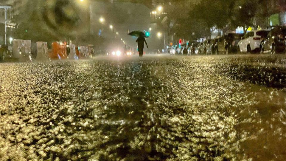 PHOTO: FILE - A person makes their way in rainfall from the remnants of Hurricane Ida, Sept. 1, 2021, in the Bronx borough of New York City. (David Dee Delgado/Getty Images, FILE)