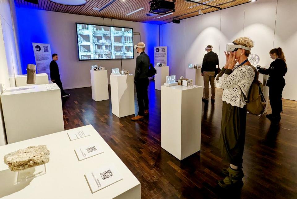 Photos from past presentations of The War Up Close VR exhibit.