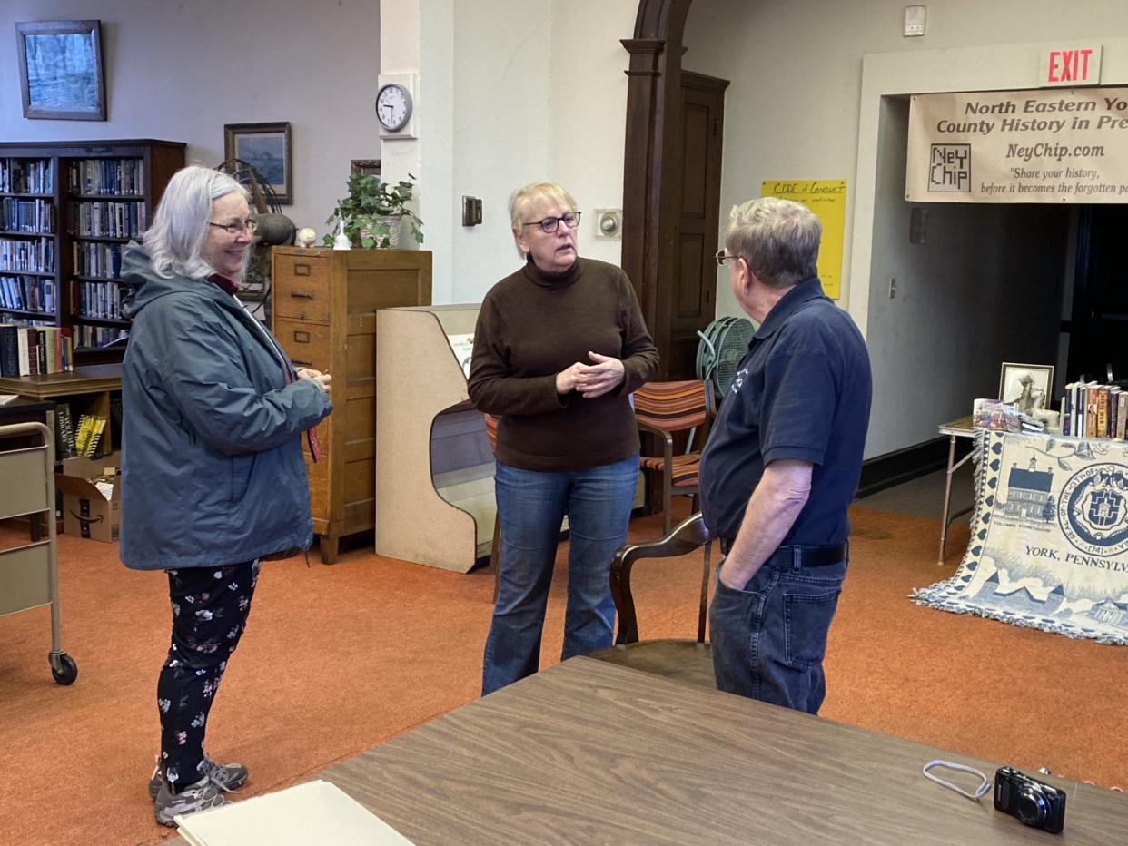 From left, York Haven Councilwoman Robin Isaacson; Cynthia Owad, librarian; and NeyChip’s Charles Stambaugh talk in the library in the York Haven Borough Building.