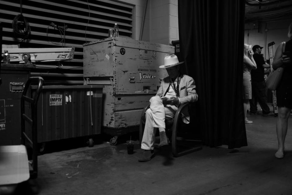 <p>Political advisor Mark McKinnon looks over his phone in the back corridors during the DNC in Philadelphia, PA. on July 26, 2016. (Photo: Khue Bui for Yahoo News) </p>