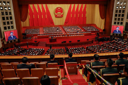 Chinese President Xi Jinping speaks at the closing session of the National People's Congress (NPC) at the Great Hall of the People in Beijing, China March 20, 2018. REUTERS/Damir Sagol