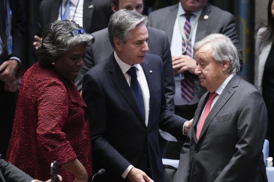 United States Secretary of State Antony Blinken, center, and U.S. Ambassador to the United Nations Linda Thomas-Greenfield, left, talk with UN Secretary-General Antonio Guterres before a Security Council meeting at United Nations headquarters, Tuesday, Oct. 24, 2023. (AP Photo/Seth Wenig)
