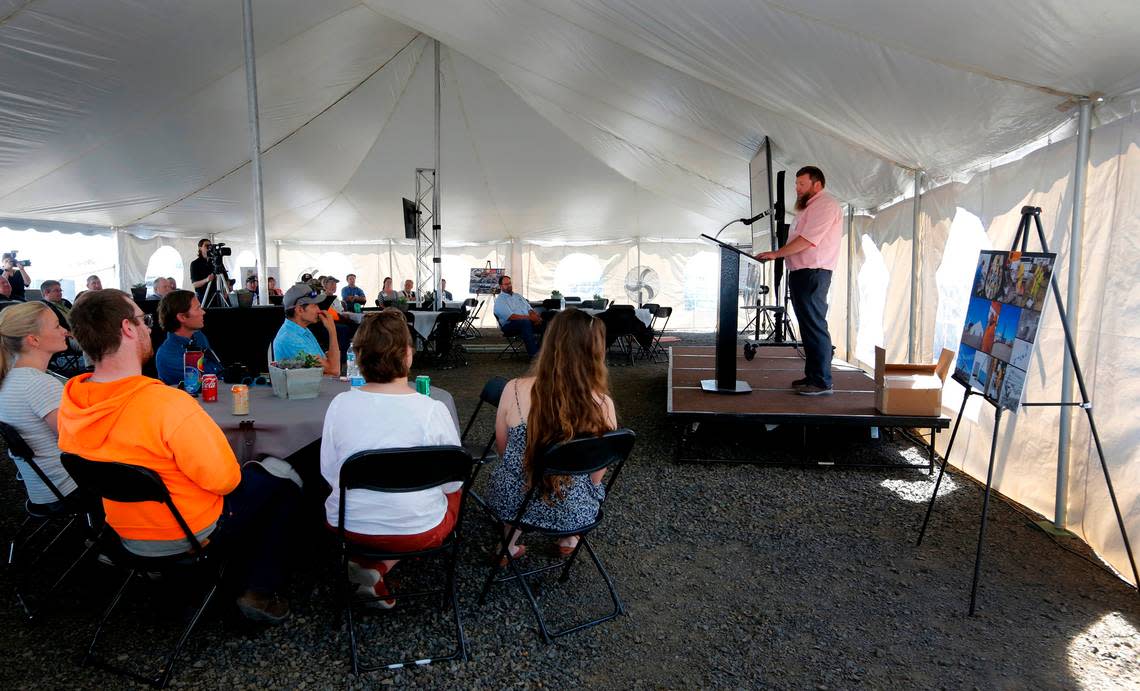 Jeremy Schmidt with the Washington Department of Ecology speaks at the celebration for the cleanup milestone, removal of 35,000 barrels of buried hazardous industrial waste at the Pasco Landfill Superfund site.