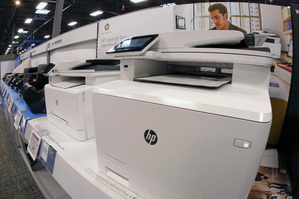This Thursday, Feb. 22, 2018 photo shows a display of Hewlett-Packard printers in a Best Buy store in Pittsburgh. (AP Photo/Gene J. Puskar)