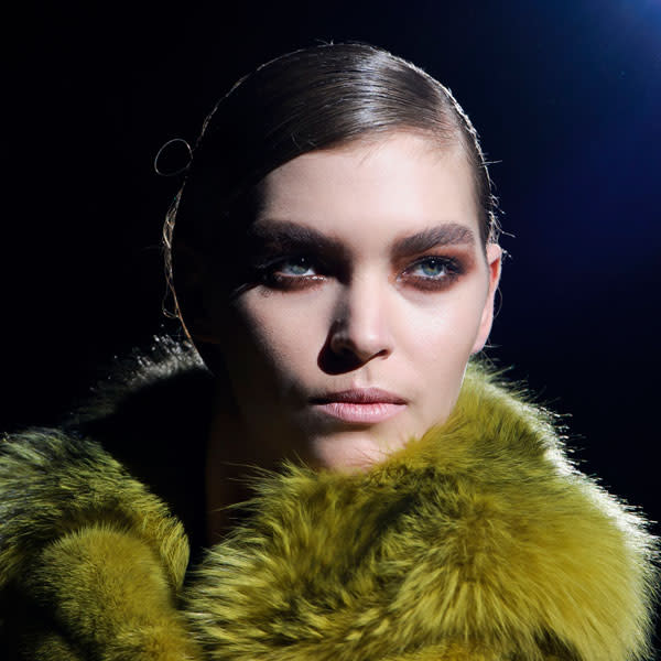 <b>Tom Ford </b><br><br>Models had rusty brown smoky eyes at the show.<br><br>Image © PA