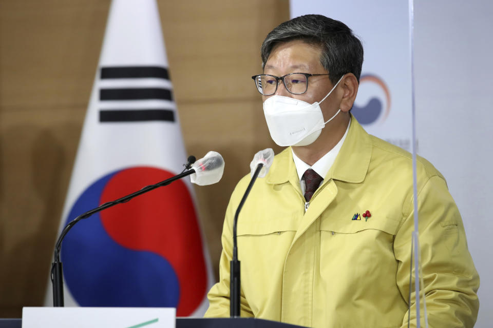 South Korea's Vice Justice Minister Lee Yong-gu speaks during a briefing at the government complex in Seoul, South Korea, Dec. 31, 2020. South Korea has enforced its toughest physical distancing rules at correctional facilities across the country after a major cluster of coronavirus infections flared at a Seoul prison. (Lee Jung-hun/Yonhap via AP)