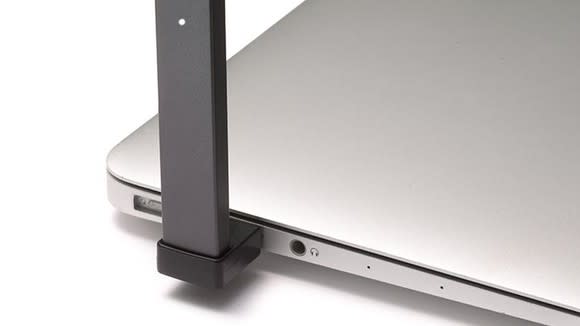 JUUL device charging via a laptop computer