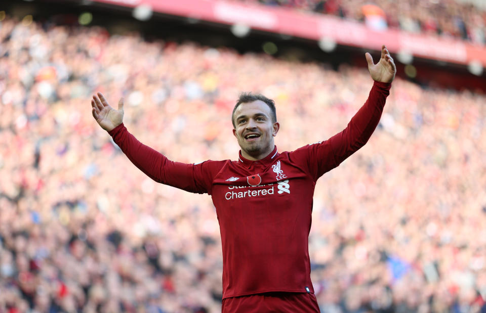 Xherdan Shaqiri celebrates Liverpool’s second goal, which put the game beyond Fulham