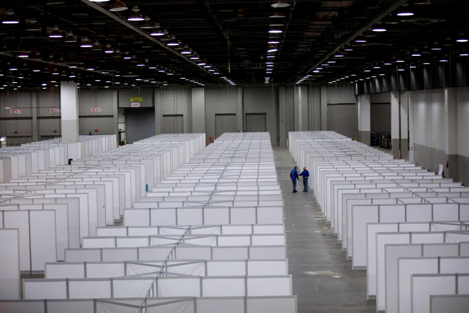 Image: The Detroit TCF convention center is converted into a field hospital to treat coronavirus patients on April 1, 2020. (Emily Elconin / Reuters)