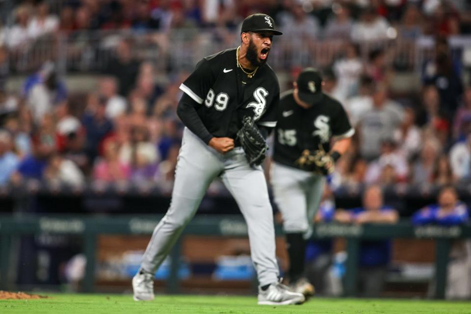 Chicago White Sox relief pitcher Keynan Middleton (99) reacts after an out against the Atlanta Braves in the eighth inning on July 15, 2023, at Truist Park.