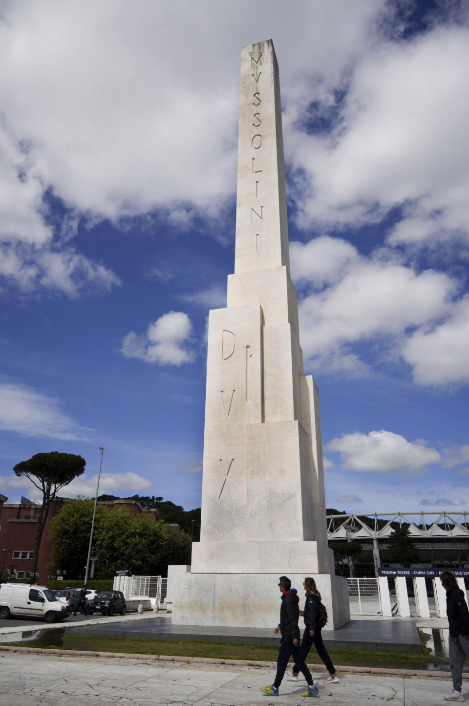 A marble obelisk by architect Costantino Costantini with writing reading in Latin MVSSOLINI DVX (Mussolini Leader) stands at the Foro Italico sporting complex, formerly called Foro Mussolini (Mussolini's Forum), in front of the Olympic Stadium, in Rome, Monday, May 6, 2019. It is one of the few public references to Mussolini which remained after WWII. The Foro was built under Mussolini's regime to bolster Rome's bid for the Olympics in the 1940's, the obelisk was built in 1932. (AP Photo/Andrew Medichini)