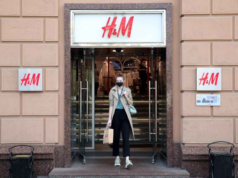 A woman leaves an H&M store in central Moscow.