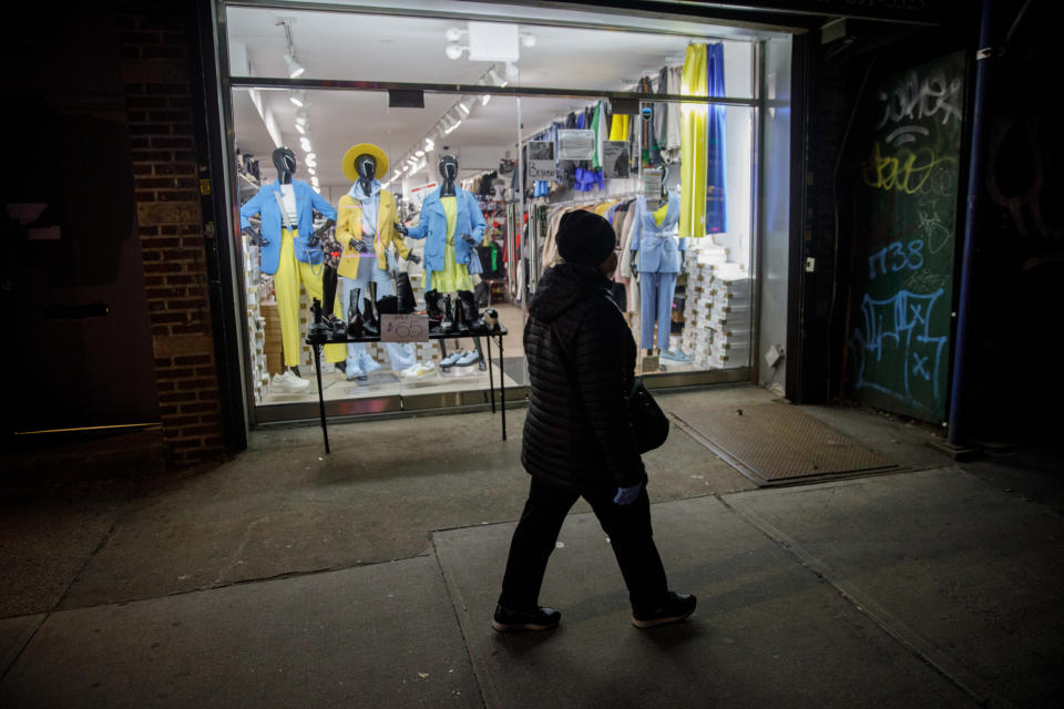 Outfits in the colors of the Ukrainian flag are displayed inside Exclusive Women's Wear in the Brighton Beach neighborhood of Brooklyn, N.Y., on March 4, 2022. (Julius Constantine Motal / NBC News)