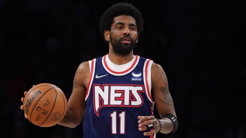 Brooklyn Nets guard Kyrie Irving (11) runs up the court during the first half of Game 4 of an NBA basketball first-round playoff series against the Boston Celtics, Monday, April 25, 2022, in New York. (AP Photo/John Minchillo)