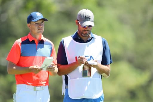 Jordan Spieth of the US waits with caddie Michael Greller on the sixth tee during the first round of the 2018 US Open, at Shinnecock Hills Golf Club in Southampton, New York, on June 14