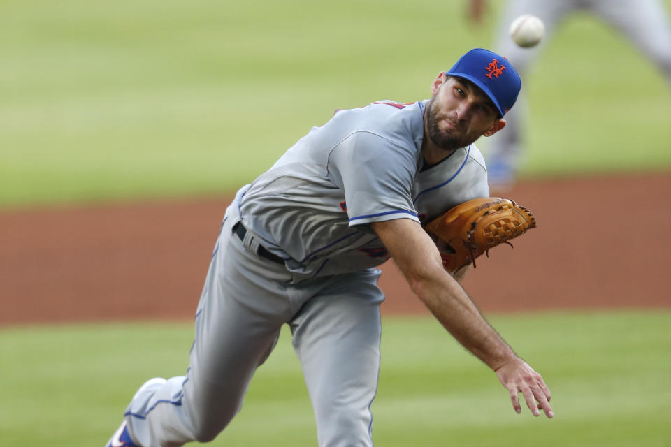 New York Mets starting pitcher Michael Wacha works in the first inning of the team's baseball game against the Atlanta Braves on Saturday, Aug. 1, 2020, in Atlanta. (AP Photo/John Bazemore)