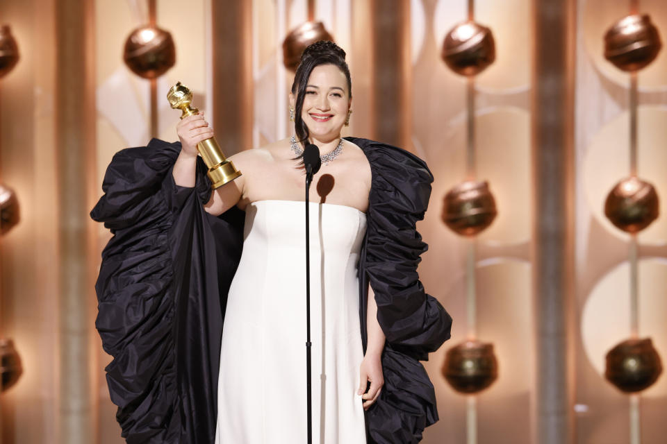 This image released by CBS shows Lily Gladstone as she accepts the award for best female actor in motion picture - drama for her role in "Killers of the Flower Moon" during the 81st Annual Golden Globe Awards in Beverly Hills, Calif., on Sunday, Jan. 7, 2024. (Sonja Flemming/CBS via AP)