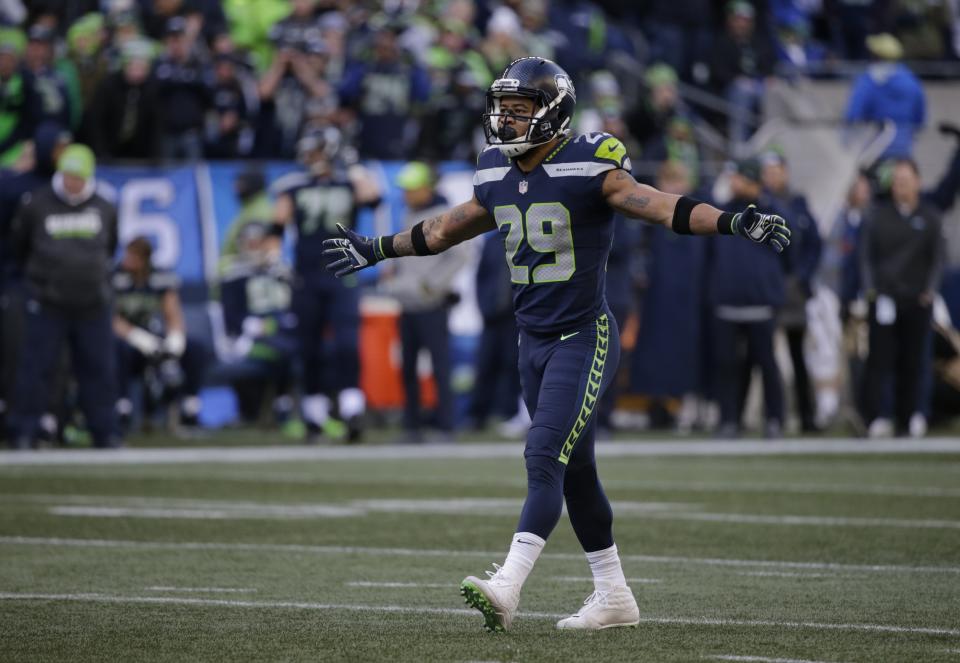 Seahawks free safety Earl Thomas is looking to secure his future in Seattle by holding out from team activities. (AP Photo)