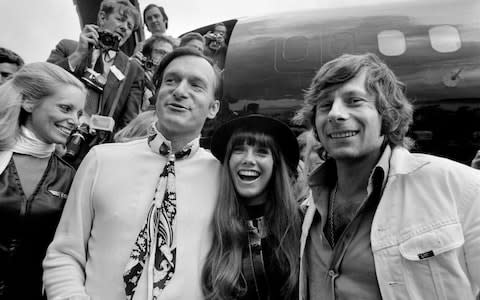 Polanski in 1970 with Hugh Hefner and Barbara Benton - Credit: STAFF/AFP