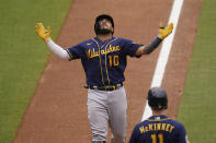 Milwaukee Brewers' Omar Narvaez looks up as he nears the plate on his two-run home run during the sixth inning of the team's baseball game against the San Diego Padres, Wednesday, April 21, 2021, in San Diego. (AP Photo/Gregory Bull)