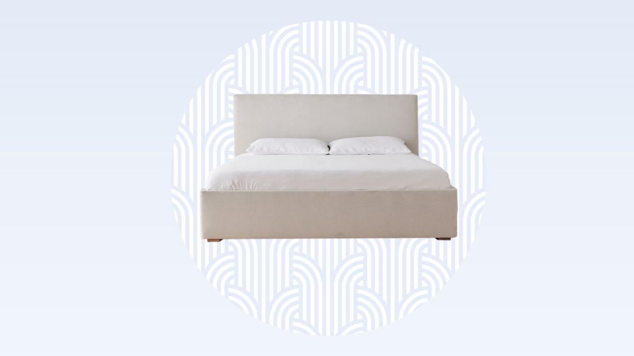 a bed with a white cover