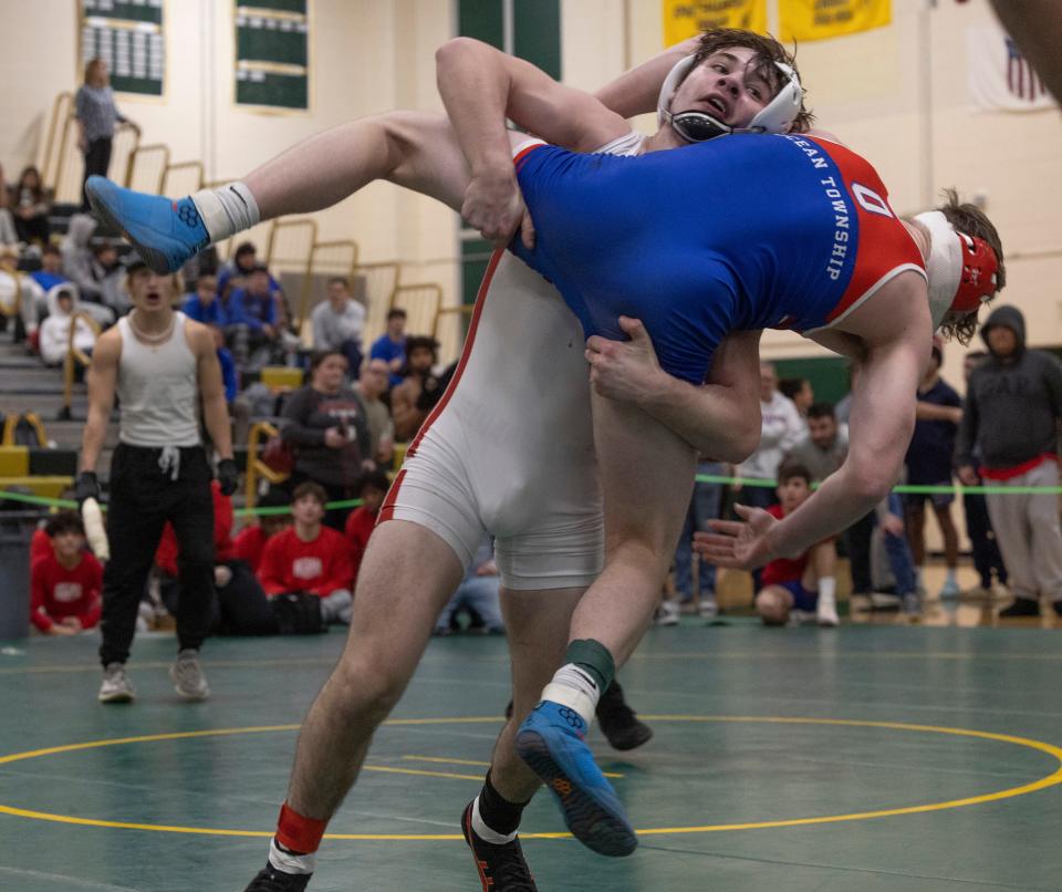 Wall's Donovan DiStefano (left) defeated Ocean's James Farina 7-5 Wednesday in the 150-pound final of the Mustang Classic at Brick Memorial.