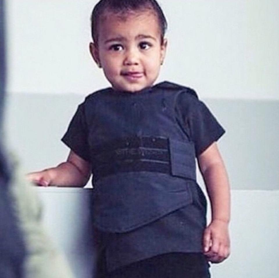 "Look at my little cutie!!! #DaddysMuse #BabyYeezyBulletProofVest"