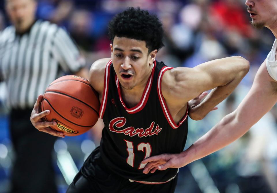 George Rogers Clark's Sam Parrish drives in the first half of the UK HealthCare Boys Sweet 16 tournament Wednesday at Rupp Arena. March 15, 2022