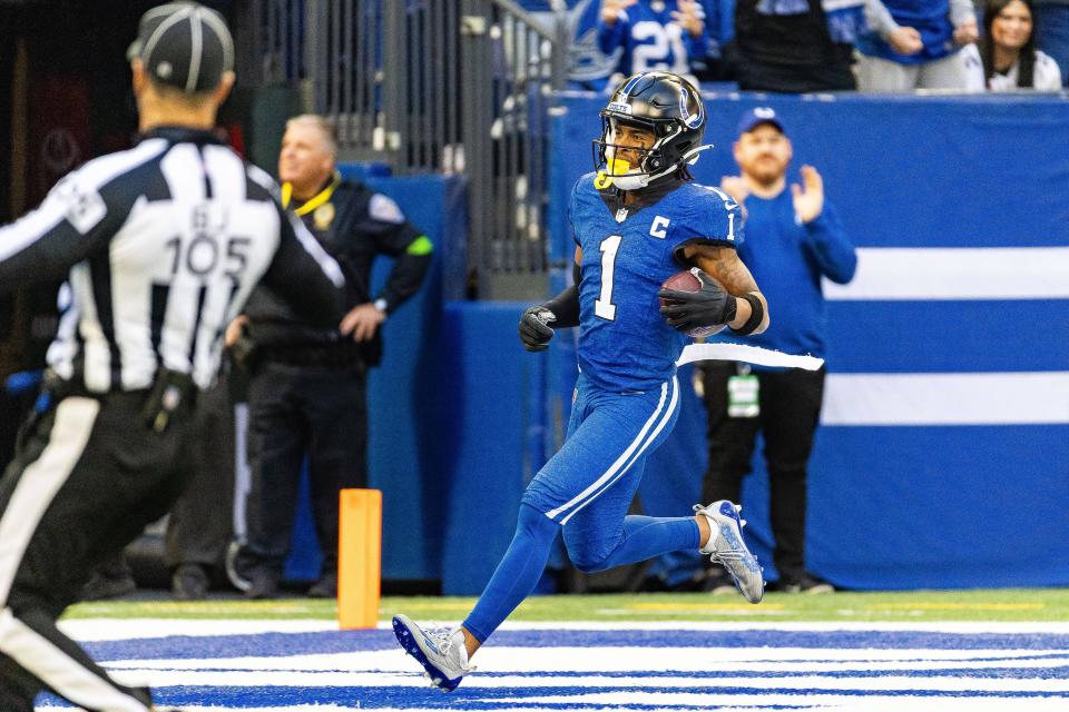 Colts wide receiver Josh Downs scores on a 59-yard pass from quarterback Gardner Minshew in Sunday's 39-38 loss to the Browns.