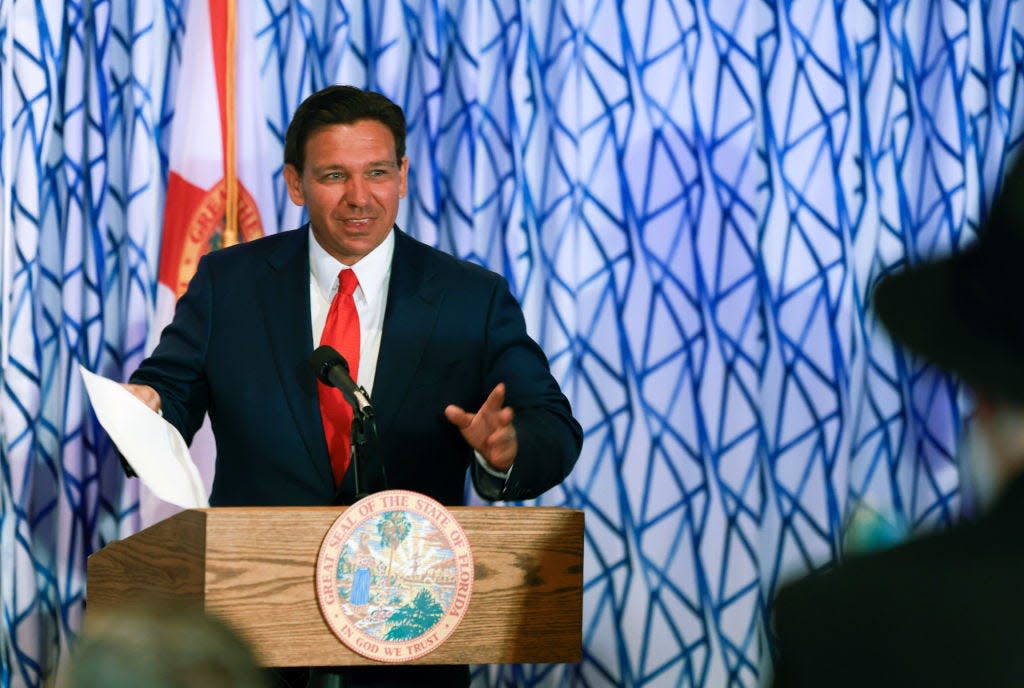 Florida Gov. Ron DeSantis during a news conference held at the Santorini by Georgios restaurant on March 20, 2024 in Miami Beach. DeSantis talked about preventing unauthorized camping and public sleeping during the event and signed HB 1365, which addresses homelessness.