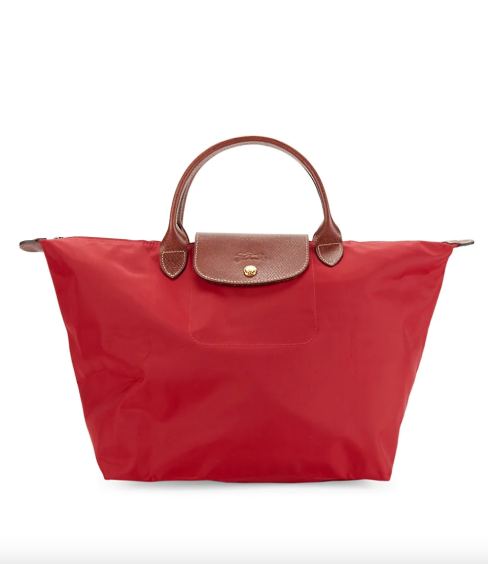 Longchamp ‘Le Pliage’ Top Handle Bag in Red (Photo via Saks Off Fifth)