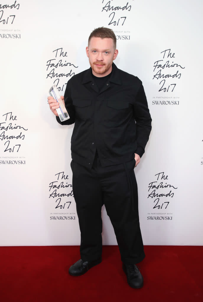 <p>FKA Twigs stepped up to award Craig Green with the trophy for British Designer of the Year in the menswear category. Backstage, he stressed the need for university tuition fees to be cut so that young designers “could get the chance to make mistakes.” <em>[Photo: Getty]</em> </p>