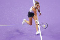 Aryna Sabalenka, of Belarus, hits to Ons Jabeur, of Tunisia, in the WTA Finals tennis tournament in Fort Worth, Texas, Monday, Oct. 31, 2022. (AP Photo/Tim Heitman)