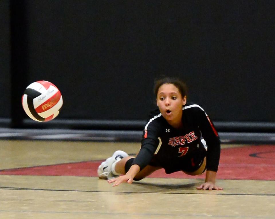 Durfee’s Alexis Layne attempts to keep the play alive during a recent game against Case.