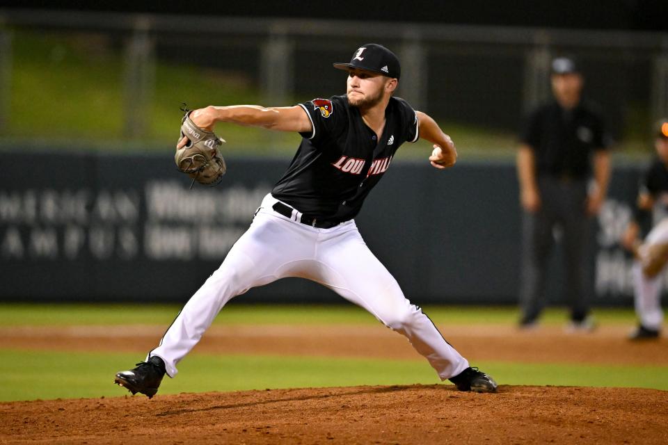 Jun 10, 2022; College Station, TX, USA; Louisville pitcher Tate Kuehner (40) delivers the pitch in the bottom of the fifth during the super regional against the Texas A&M Mandatory Credit: Maria Lysaker-USA TODAY Sports