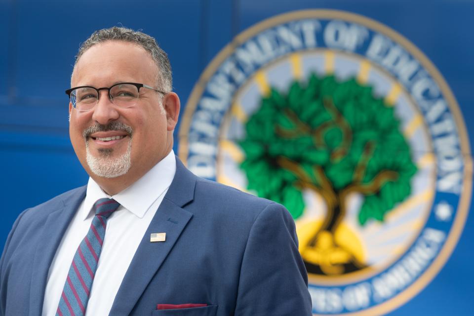 Miguel Cardona, U.S. secretary of education, smiles as he listens to the Topeka High Drumline on Tuesday morning outside of TCALC. Cardona was visiting Topeka as part of a "Raise the Bar" bus tour.