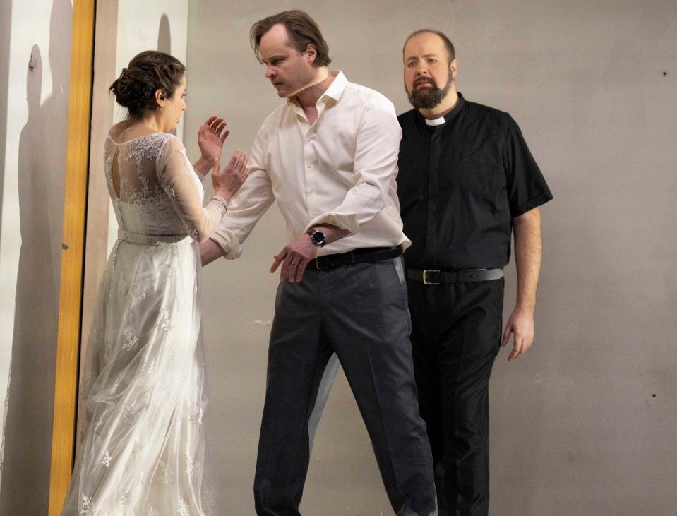 Lilian Farahani as Stela, Markus Nykänen as Tuomas and Timo Riihonen as the Priest in Kaija Saariaho's harrowing opera Innocence at the Royal Opera House - Alastair Muir