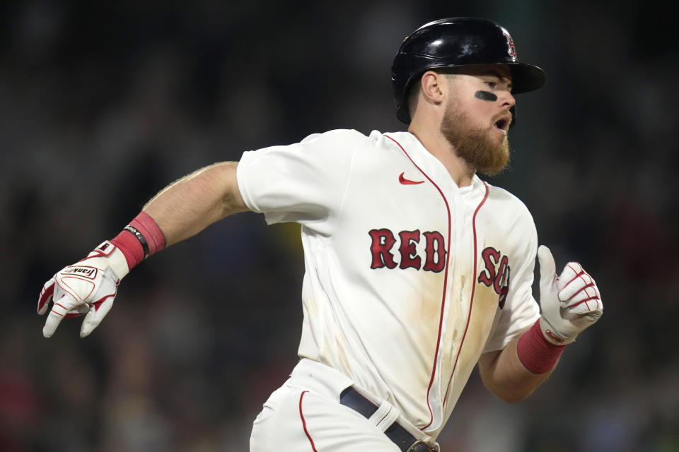 Boston Red Sox's Christian Arroyo dashes down the first base line on his solo home run in the seventh inning during a baseball game against the Colorado Rockies at Fenway Park, Monday, June 12, 2023, in Boston. (AP Photo/Charles Krupa)