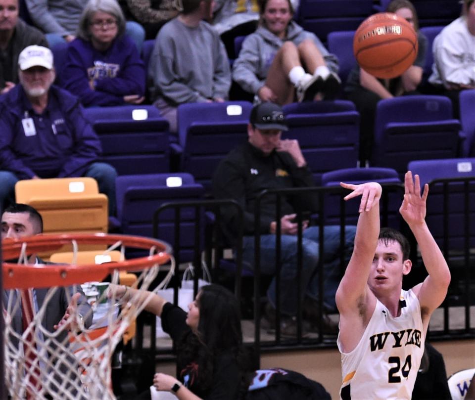 Wylie's Martin Marshall shoots a 3-point goal against Lubbock Monterey in the first half. Monterey beat the Bulldogs 56-53 in the District 4-5A game Friday, Jan. 27, 2023, at Bulldog Gym.