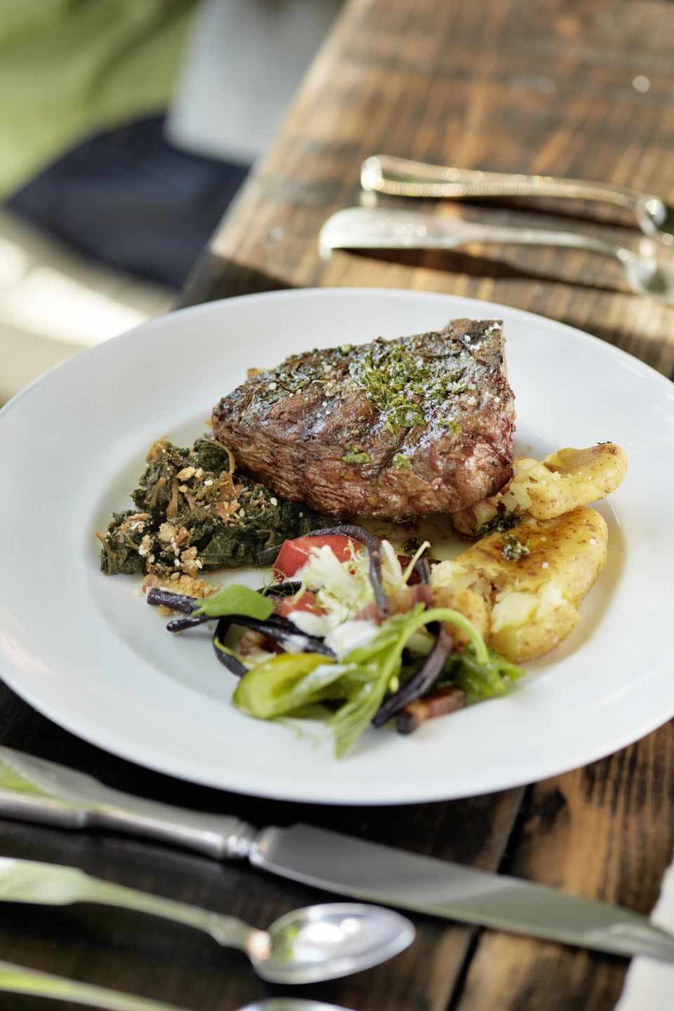 Grilled Bone-In Bison Steaks with Crisped Potatoes