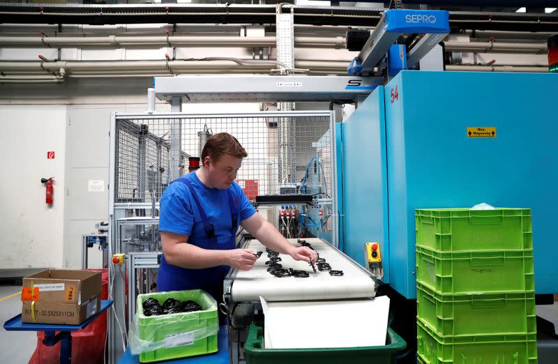 An employee works at the Simon Manufacturer of Plastic Products in Koszarhegy